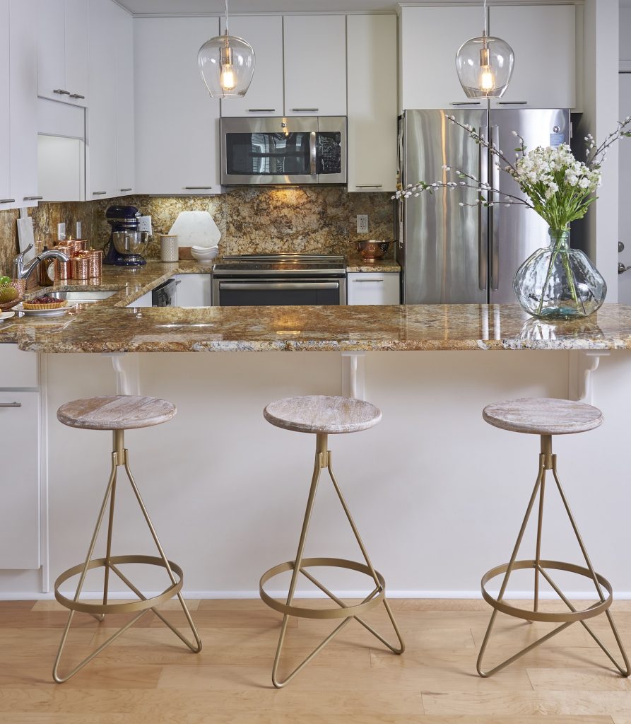 View of a kitchen bar in a Carolina Meadows apt