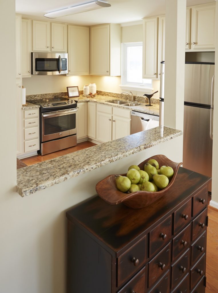 View of a kitchen inside a Carolina Meadows apartment